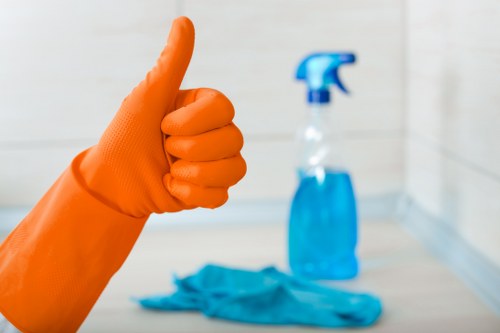 Experienced carpet cleaner in Finchley treating a commercial office carpet