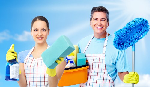 Reliable home cleaner in Finchley vacuuming a family home